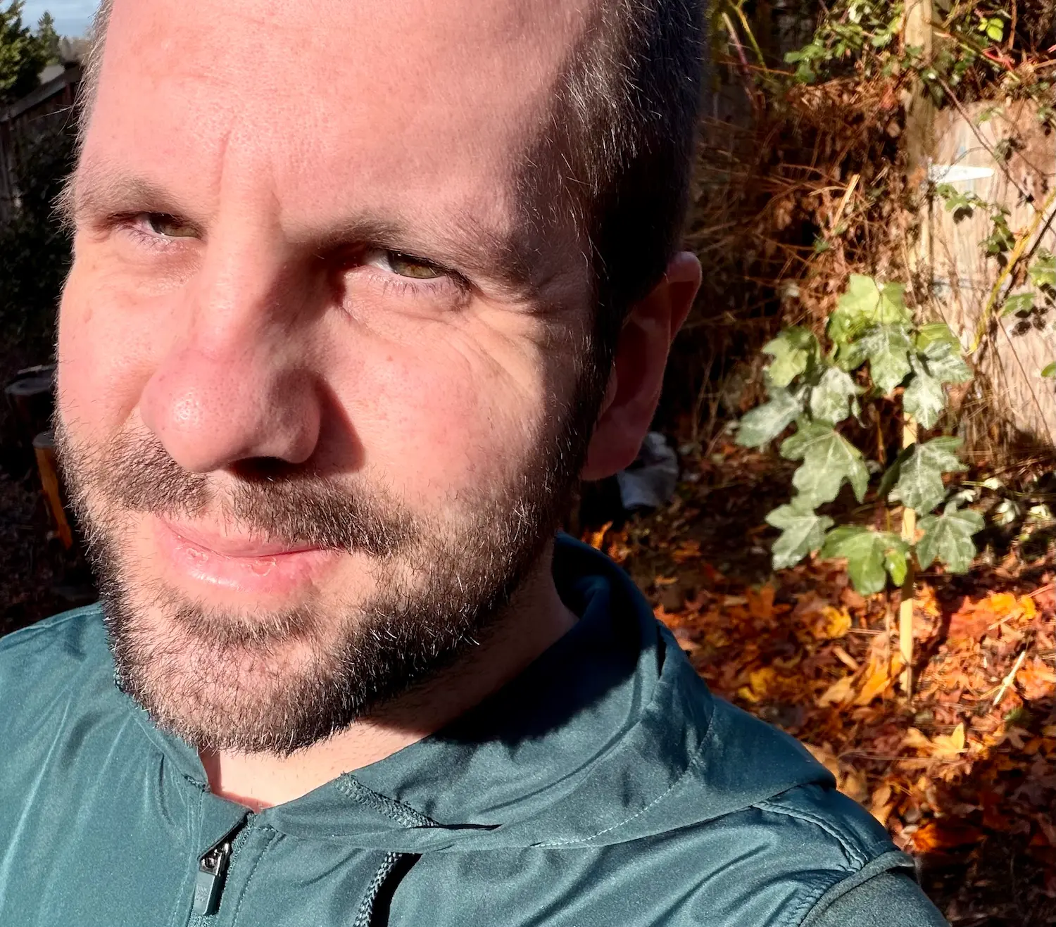 Selfie in front of planted maple tree.